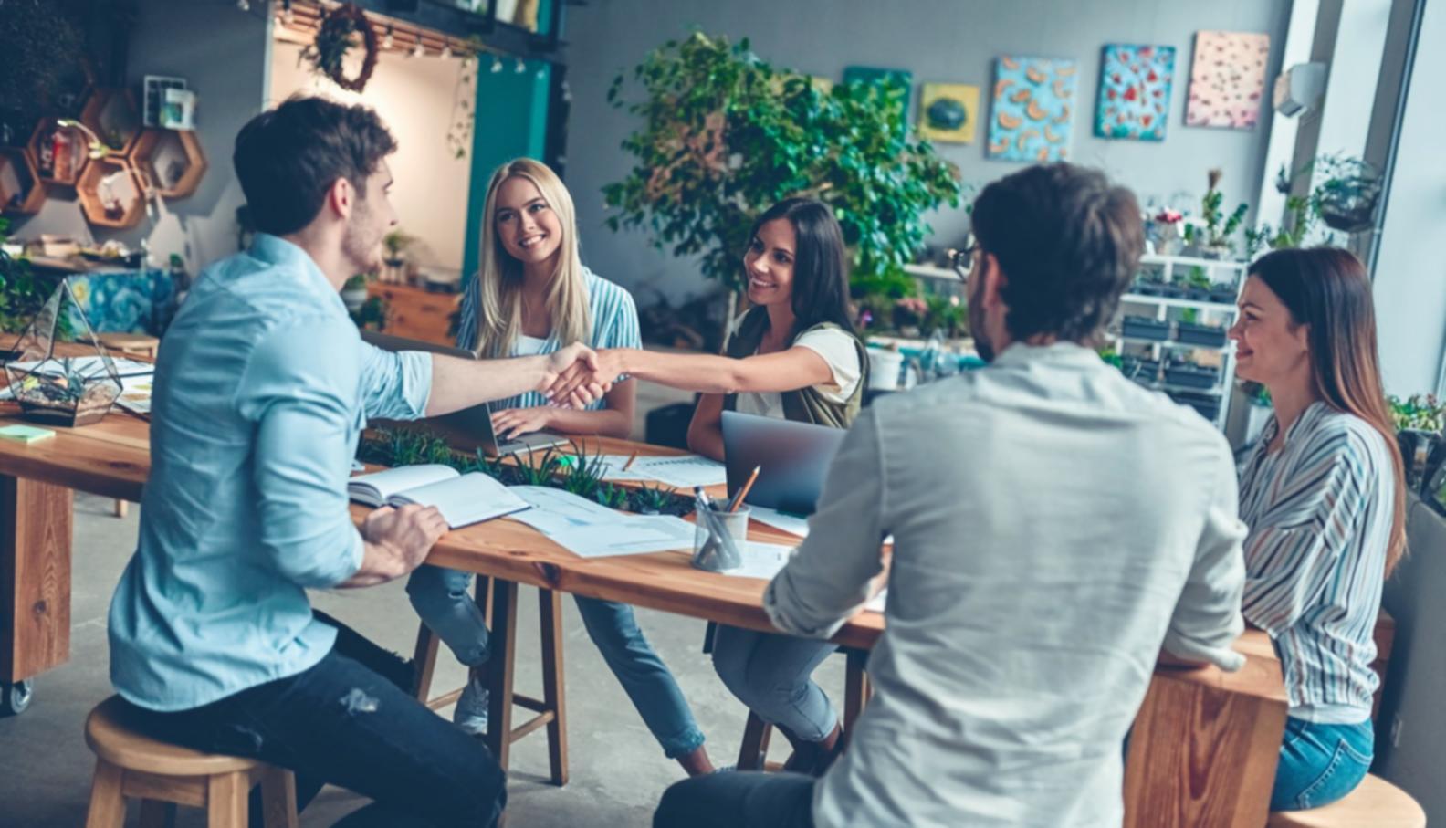 Investment analysis seminar session with participants engaged in market strategy discussion