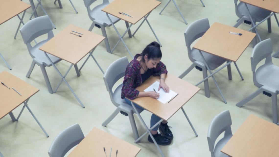 Investment analysis seminar session with participants reviewing market data